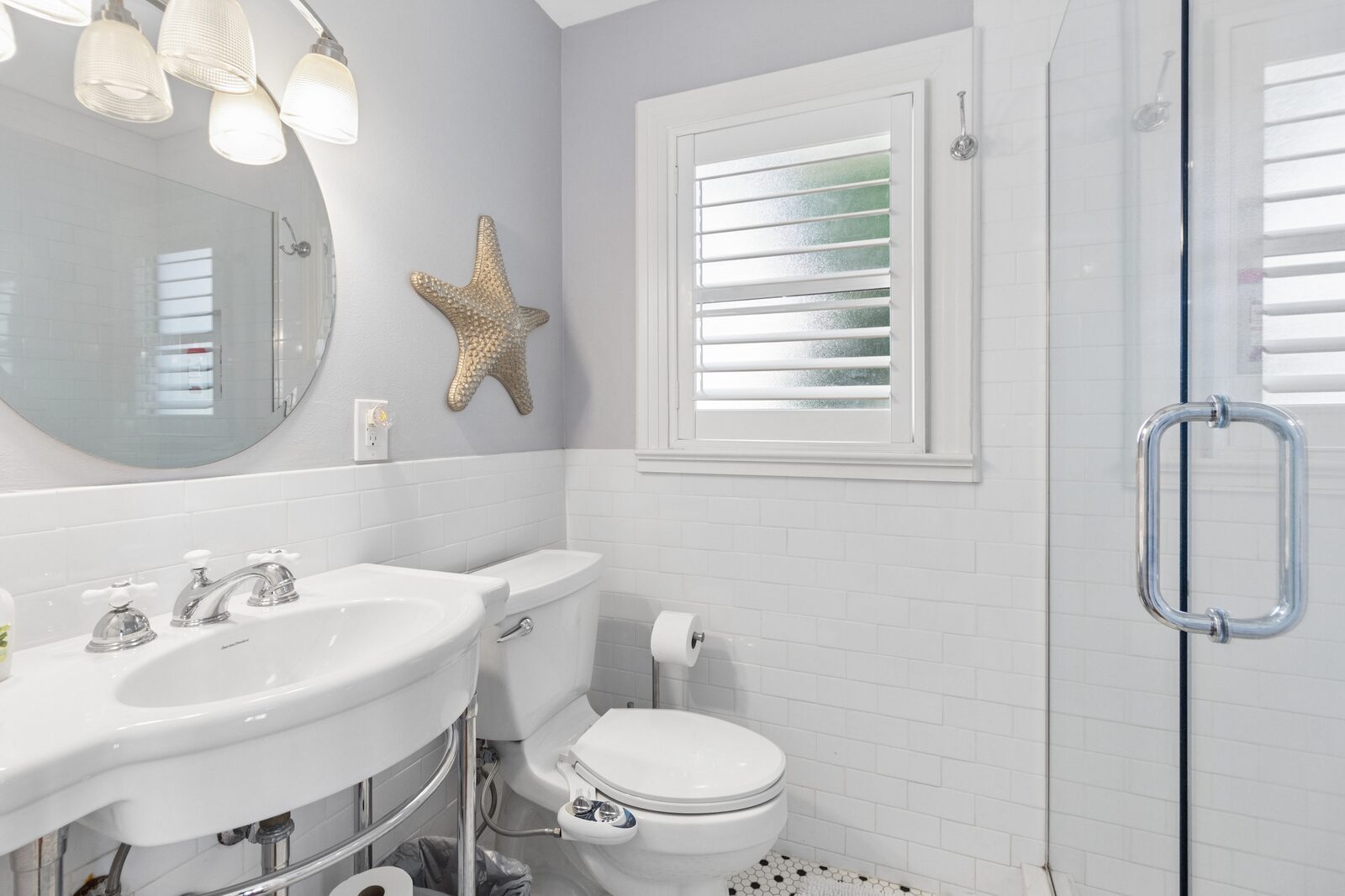 Primary bathroom — subway tile, glass shower