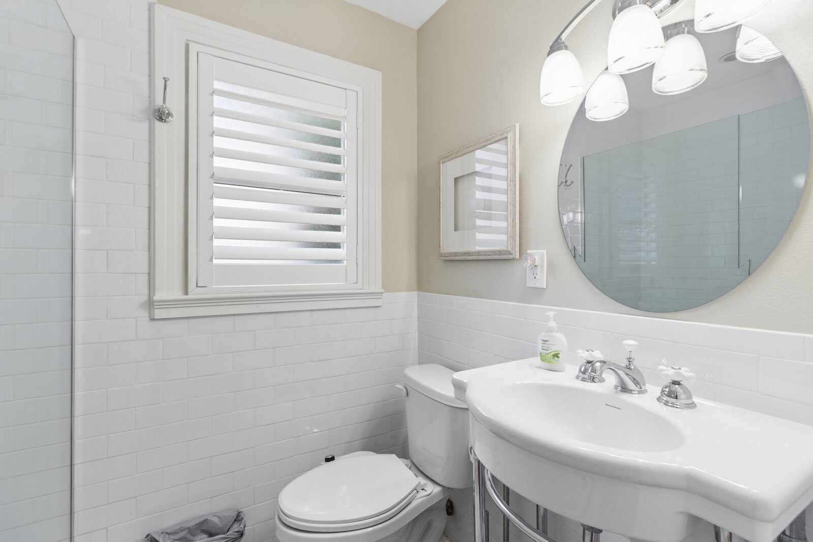 Second bathroom — subway tile, pedestal sink