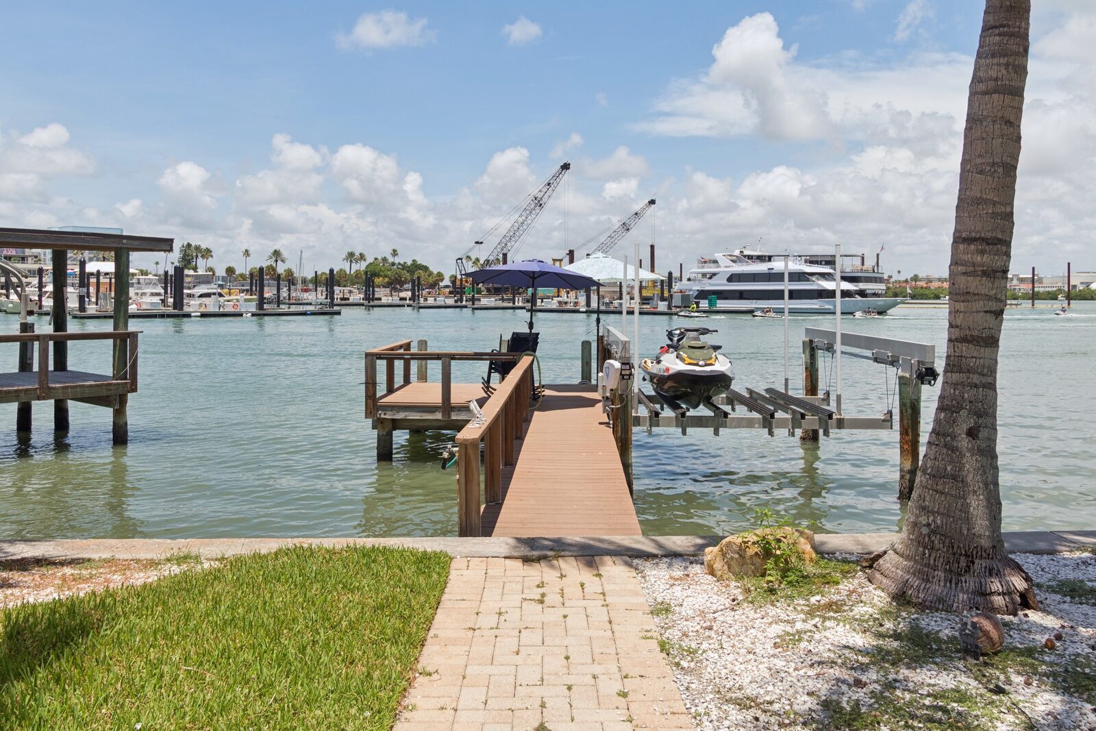 Private dock with jet ski and waterway views