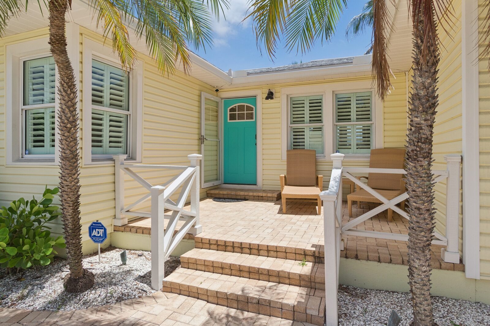 Front entry porch with teal door