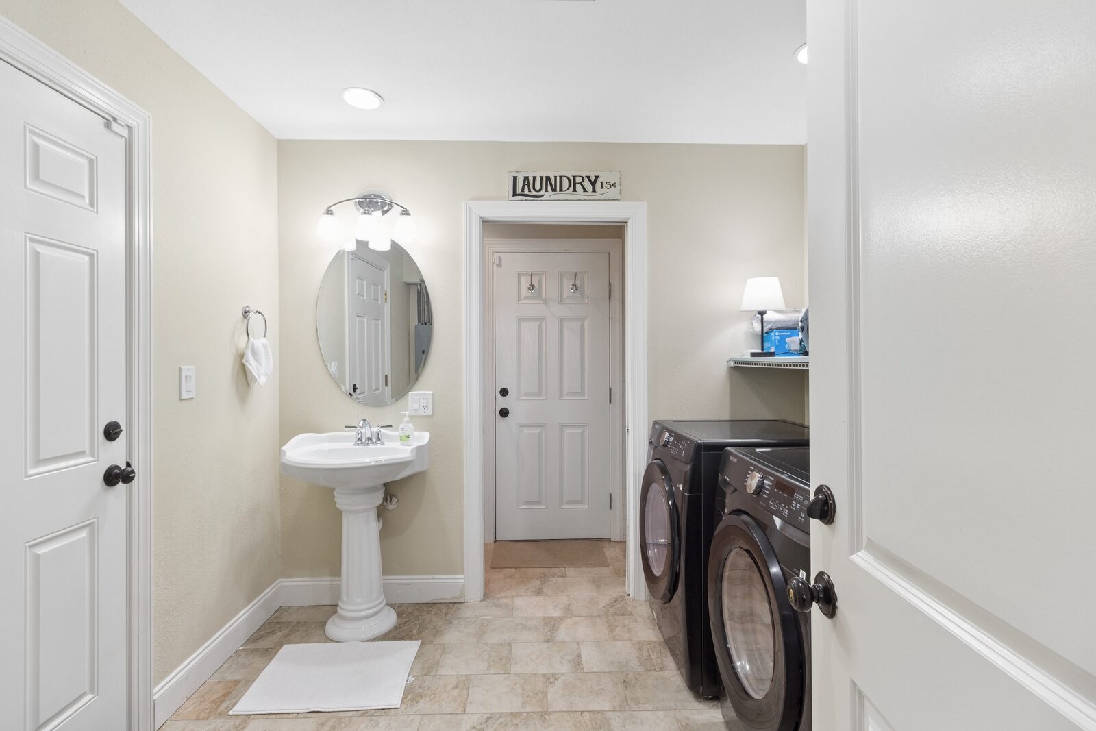 Laundry room with washer and dryer