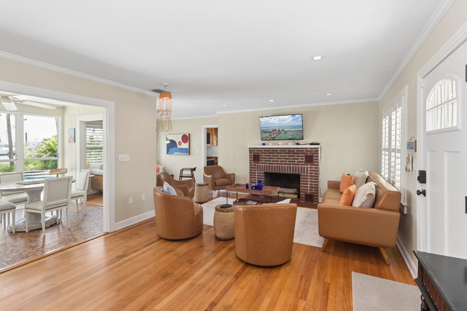 Living room with fireplace and wood floors