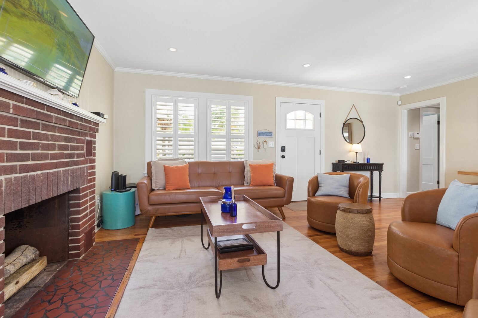 Living room sofa and brick fireplace