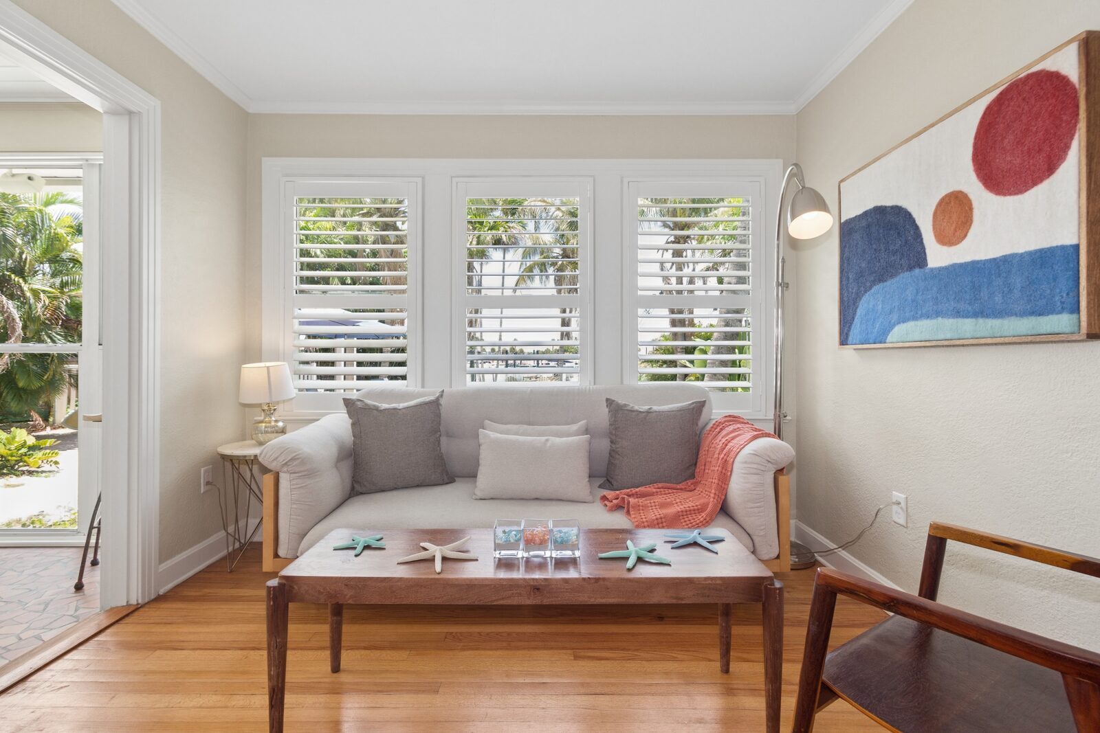 Sunroom sitting area with starfish decor