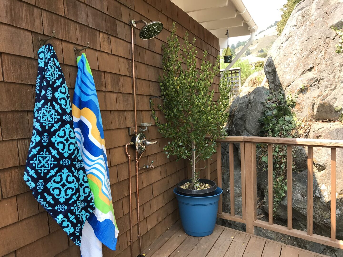 Outdoor shower with copper fixtures
