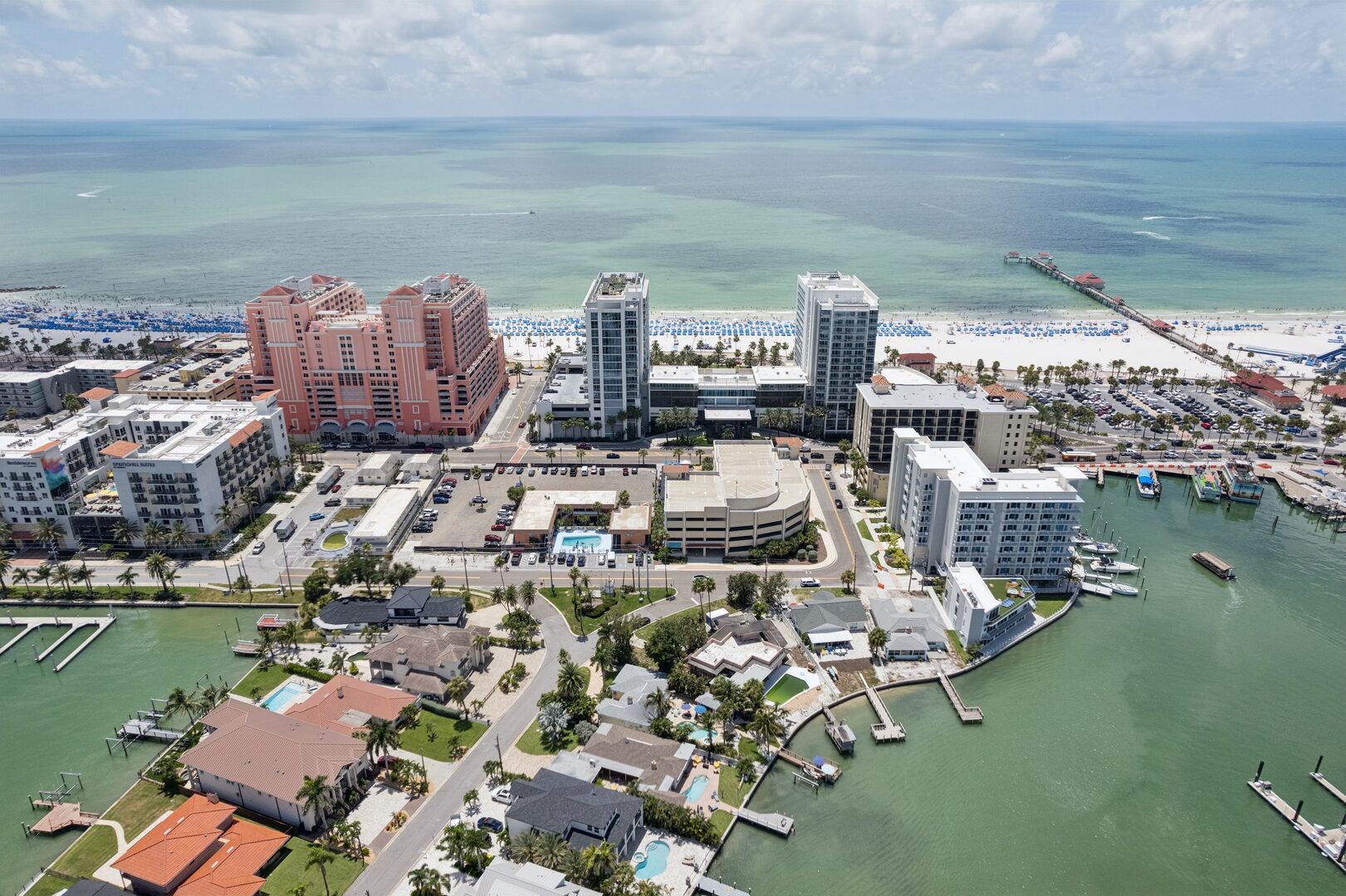 High aerial — Gulf of Mexico, beach strip and Pier 60