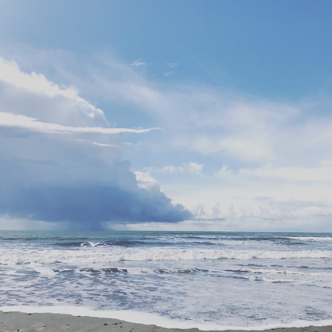 Storm clouds building over the ocean