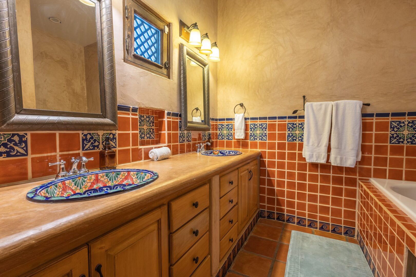 Bathroom with hand-painted Talavera double sinks