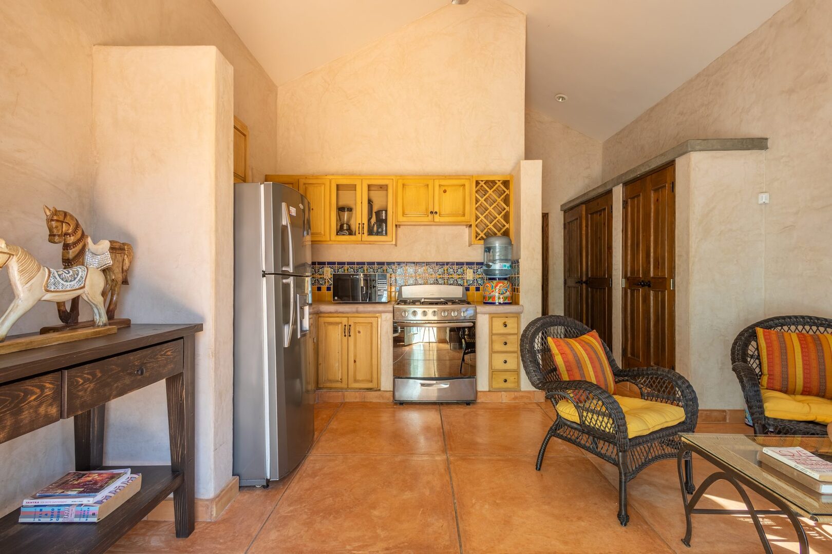 Casita kitchenette with wicker seating
