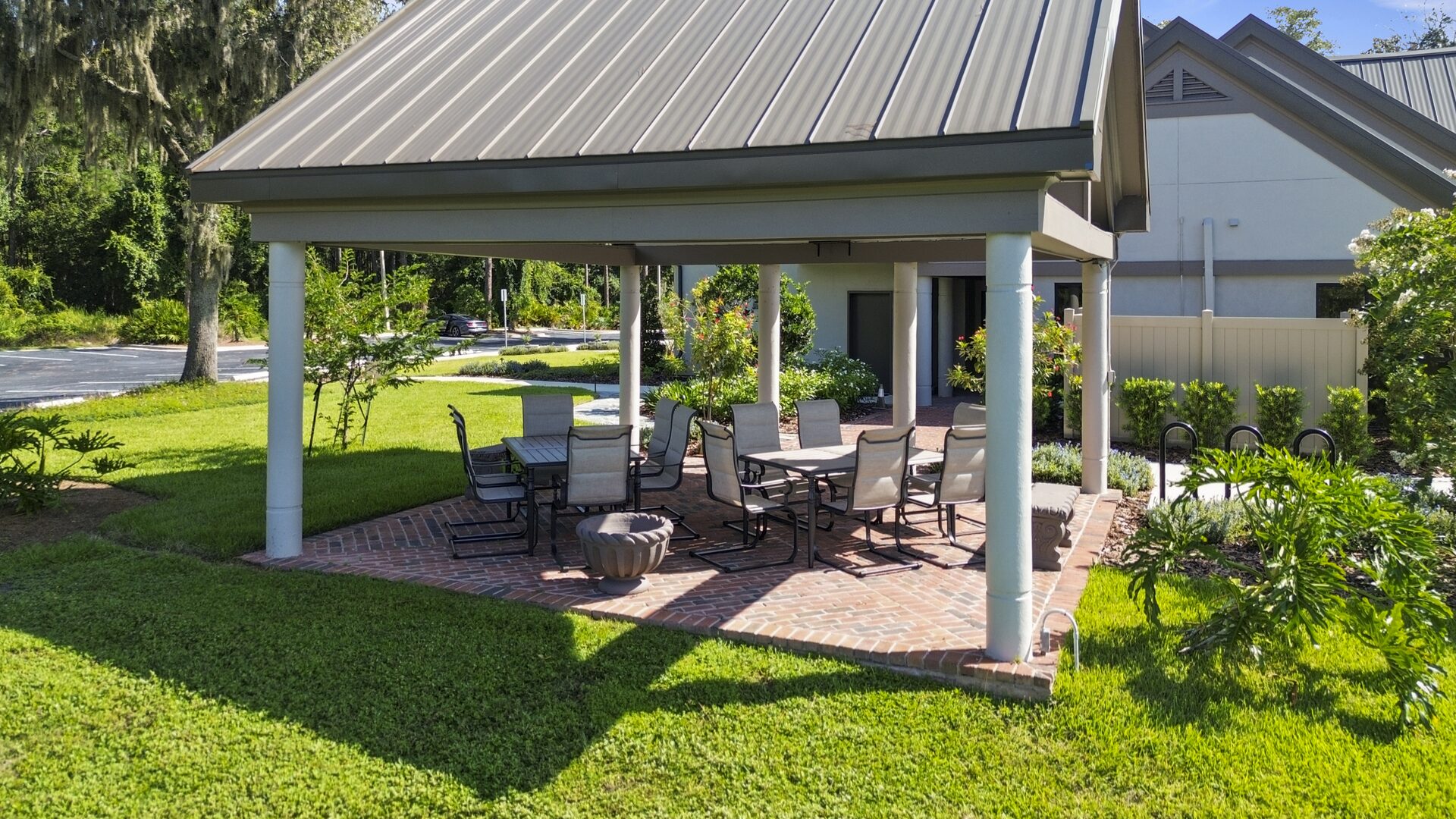 Covered courtyard pergola with outdoor dining seating