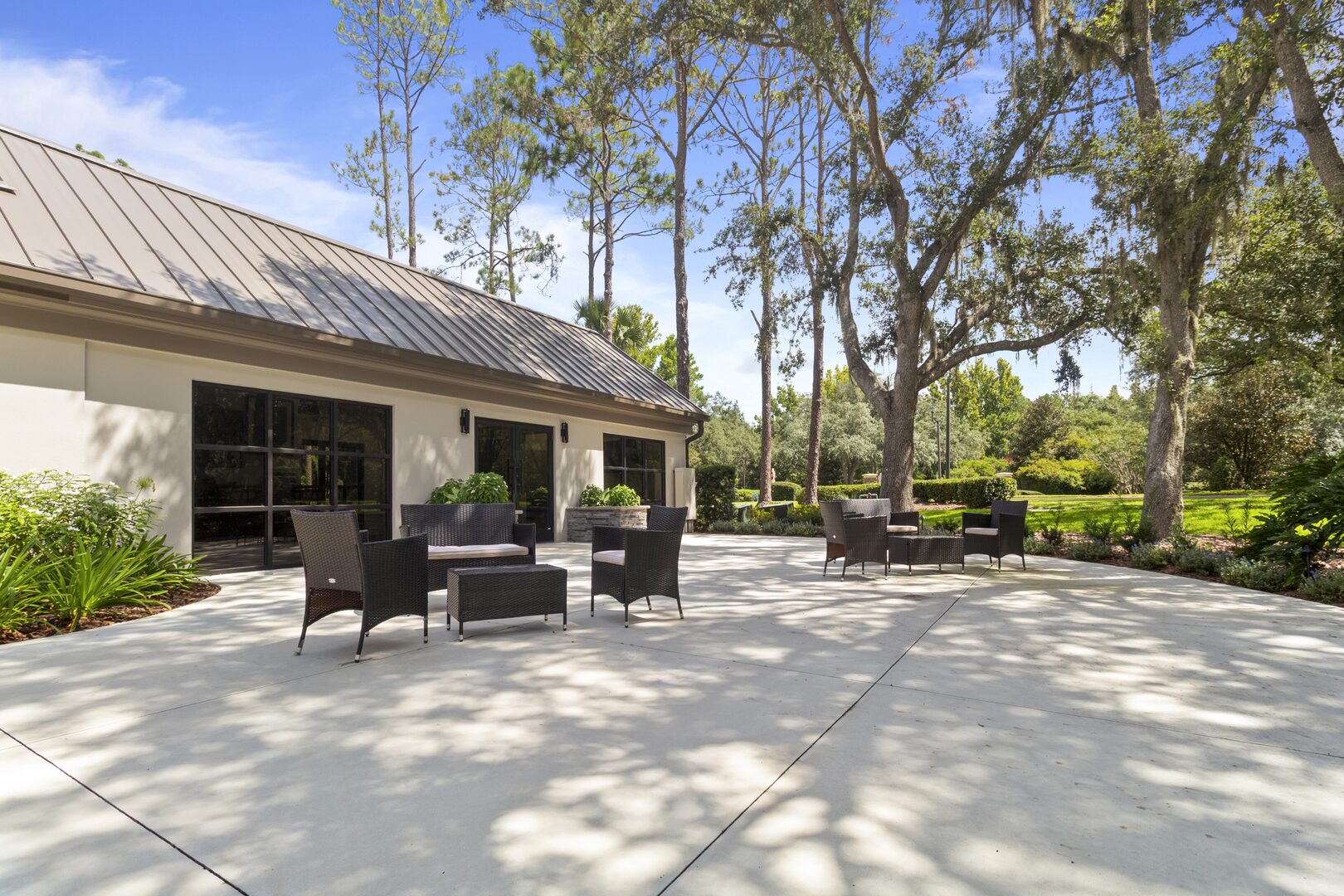 Outdoor patio seating area beside the building
